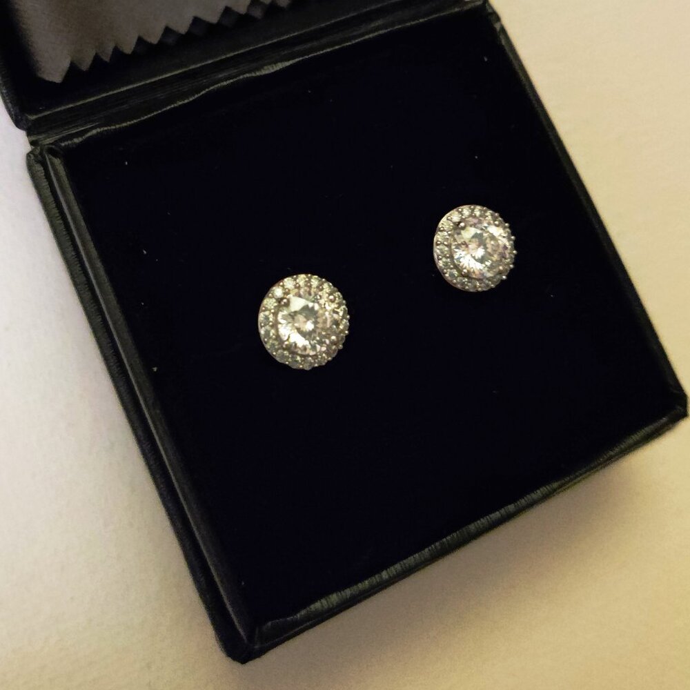 Moissanite and platinum over sterling silver earrings